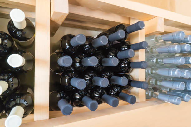 istock Wine bottleson the rack in the warehouse 1027175206