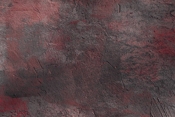 close-up view of dark grey and red rough wall textured background