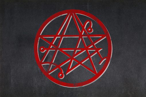 Blackboard with a the Sigil of the Gateway drawn in the middle.