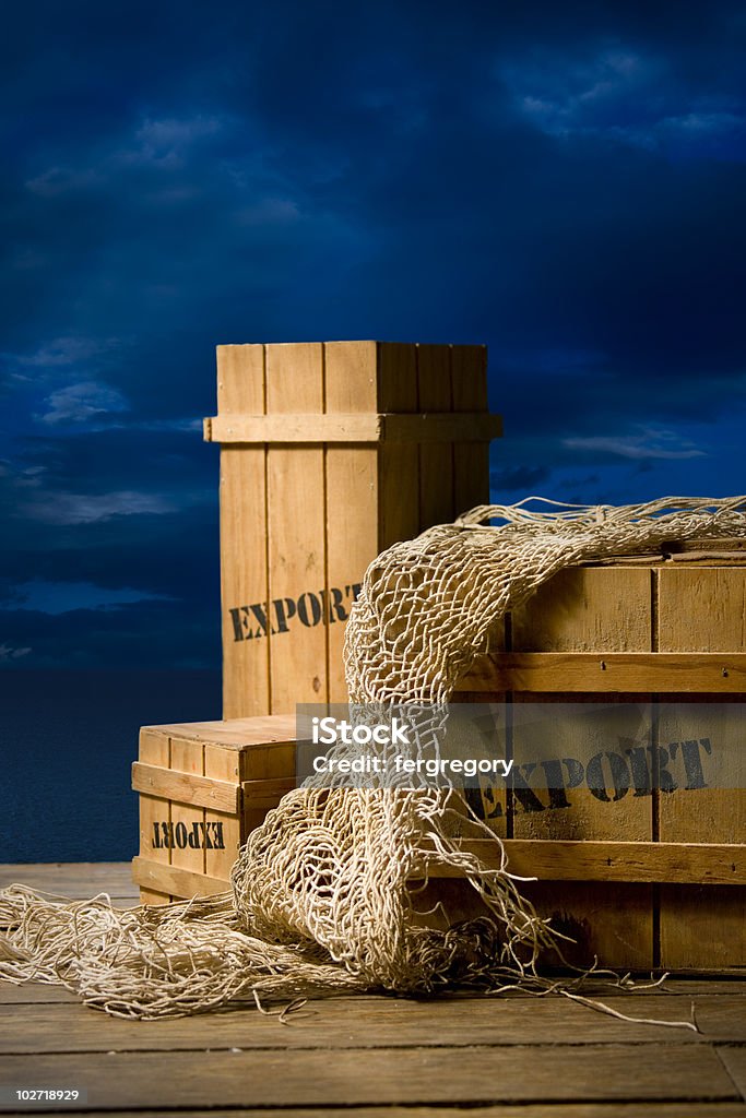 Wooden crates on dock  Box - Container Stock Photo
