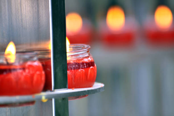 istock Flame of red candles in temple 1027190724