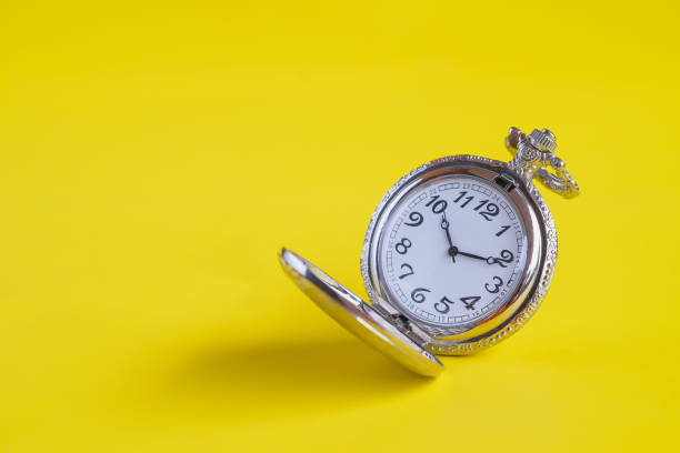 istock Vintage pocket watch on color background. 1027191184