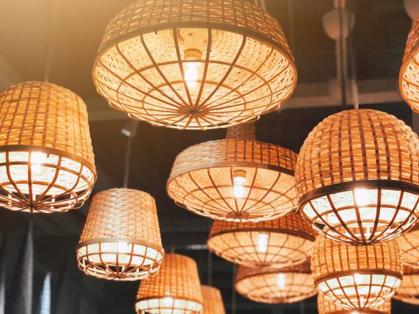 istock Weave decoration design with light bulbs, traditional local weave design, ideas, innovation thinking, natural ideas concept 1027206292