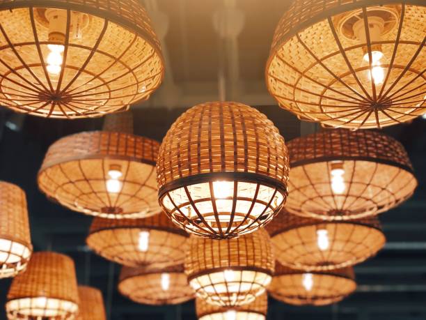 istock Weave decoration design with light bulbs, traditional local weave design, ideas, innovation thinking, natural ideas concept 1027206314
