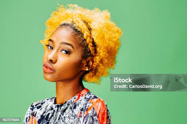 Horizontal Portrait Of A Lovely Young Girl With Bleached Curly Hair Stock Photo - Download Image Now