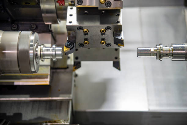 istock The multi-function CNC lathe machine or turning machine cutting the steel rod . 1027212432