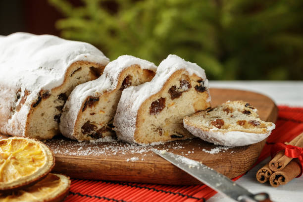 istock Stollen cake Christmas dessert cut on the table 1027215252