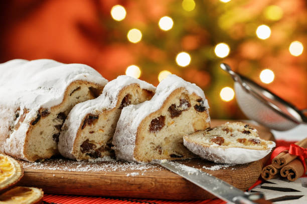 istock Stollen cake Christmas dessert cut on the table 1027215726