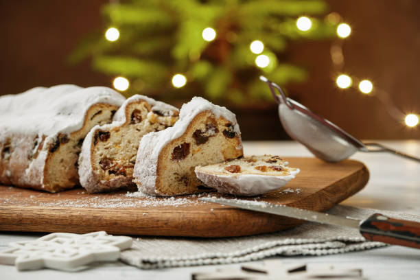 istock Stollen cake Christmas dessert cut on the table 1027216086