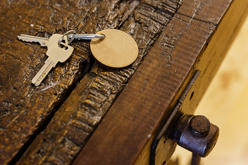 Keys on a key chain on a workbench