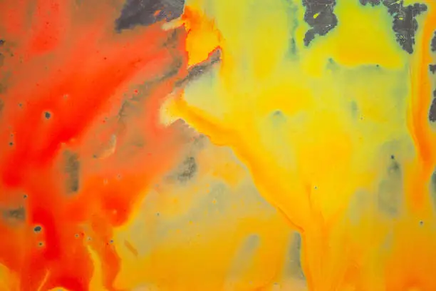 Photo of colorful abstraction of watercolor paints bright and beautiful