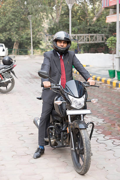 istock businessman wearing helmet - Stock image 1027234842