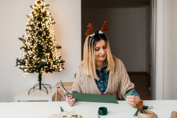 istock Mother is preparing christmass presents for kids 1027234884