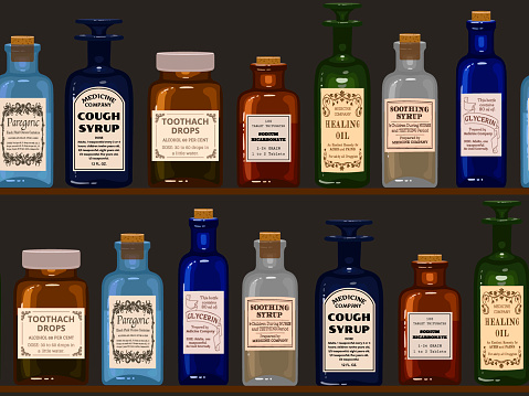 Old apothecary. Vintage bottles on wooden shelves. Seamless background