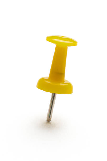 istock close up of a pushpin on white background 1027235374