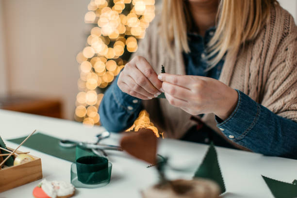 istock Mother is preparing christmass presents for kids 1027235432