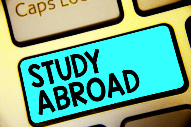 istock Writing note showing Study Abroad. Business photo showcasing Pursuing educational opportunities in a foreign country Keyboard blue key Intention computer computing reflection document 1027237718
