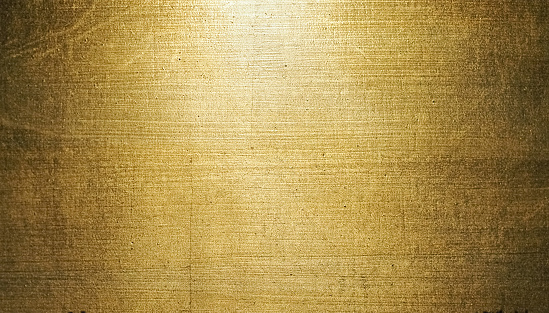 Scratched gold and black metallic background texture