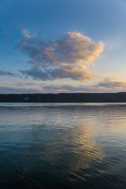 istock Germany, Clouds reflecting in lake constance at dawning in summer 1027239018
