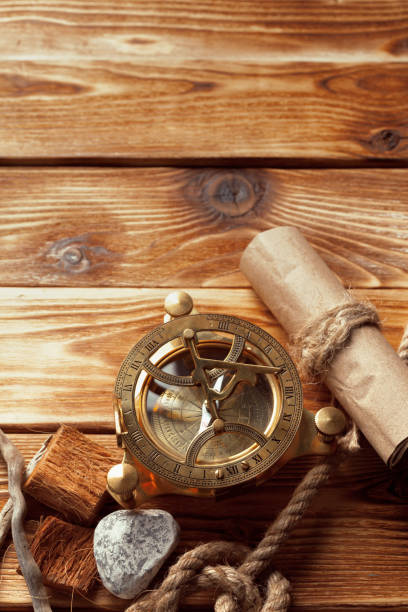 istock compass and rope on old wooden boards 1027241868