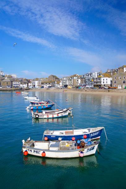 istock Boats in sunny St Ives Harbour Cornwall 1027245766