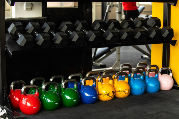 istock Dumbbells and kettlebells in the gym 1027258302