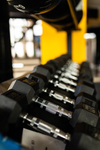 istock Dumbbells in the gym 1027258548