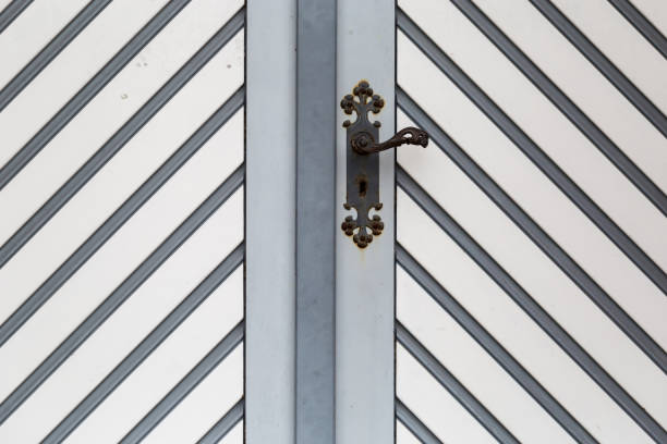 Old grey/ white wooden door with door handle