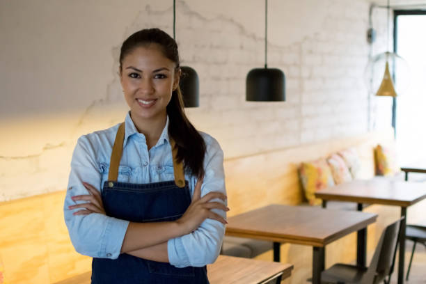 istock Beautiful business owner at her restaurant 1027262776