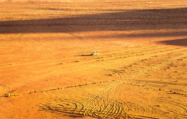 istock Old car in the Wadi Rum Desert, Jordan 1027265468