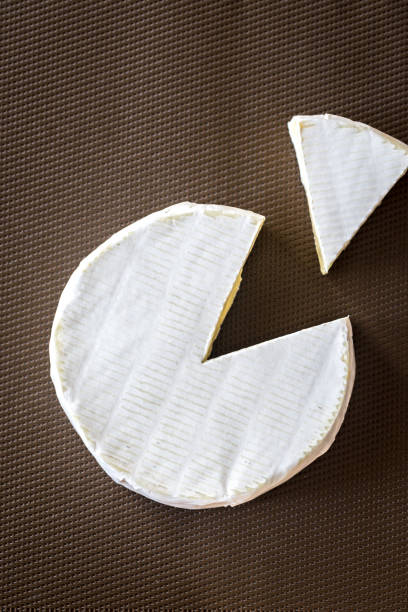 istock Camembert on the dark background 1027276672