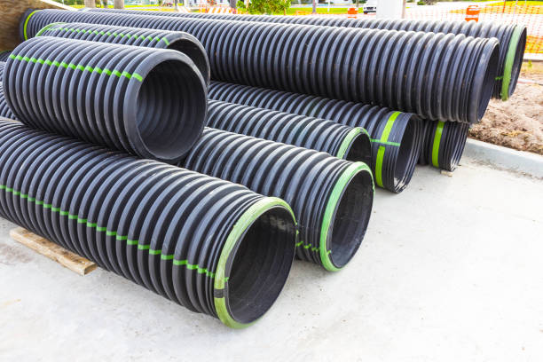 Pile of pvc. pipe for agriculturre plant Pile plastic. pipes for agriculturre plant or water pvc conduit stock pictures, royalty-free photos & images