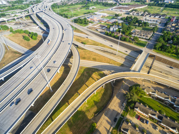 istock Top view interstate I69 expressway intersection in greater Houston, Texas, USA 1027280094