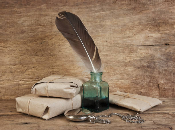 istock letter and a quill in the inkwell 1027284048