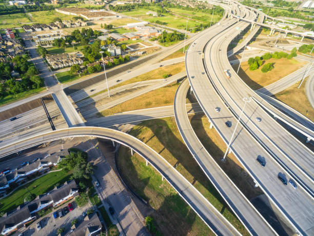 istock Top view interstate I69 expressway intersection in greater Houston, Texas, USA 1027284222