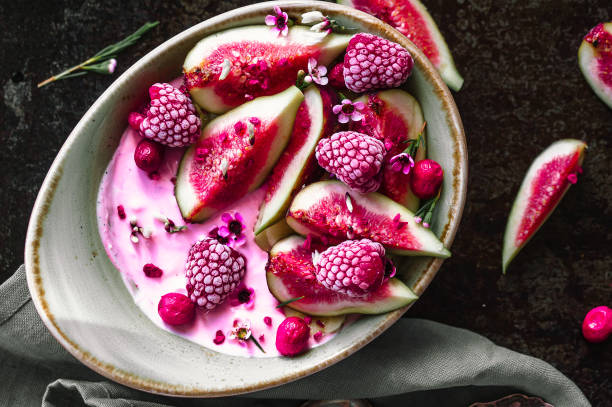 istock Healthy breakfast bowl with yogurt, fresh figs and frozen berries 1027289960