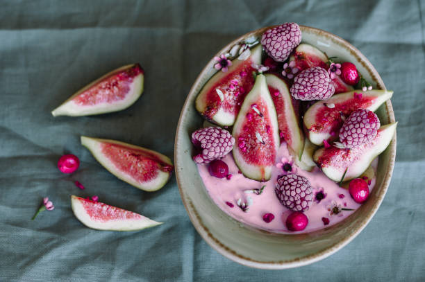 istock Healthy breakfast bowl with yogurt, fresh figs and frozen berries 1027290538