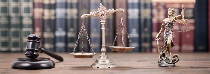 Law and Justice, Legality concept, Lady Justice, Scales of Justice and Judge Gavel on a wooden background, Law library concept.