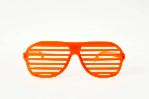 istock Orange slot glasses on white background 1027303120