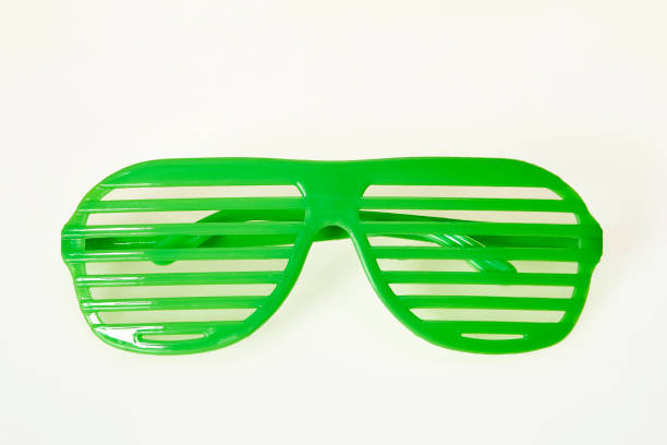 istock Green slot glasses on white background 1027303590