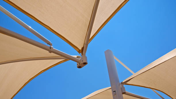 istock Awnings with blue skky background. 1027306386