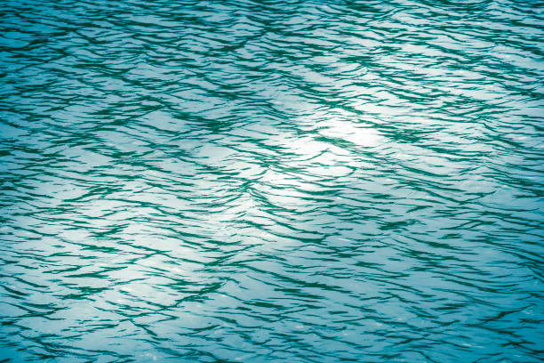 istock Beautiful pattern of blue water reflecting the sun. 1027324620