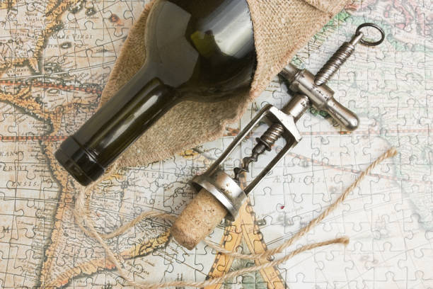 istock bottle of wine and a corkscrew 1027325120