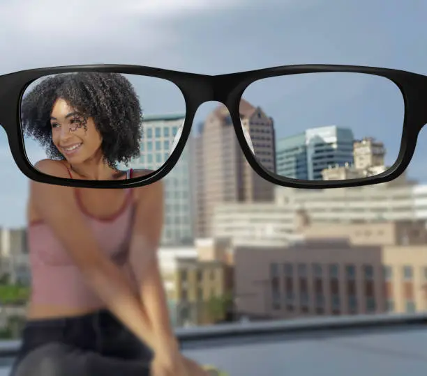 Clear vision Young woman portrait with Salt Lake City skyline in background