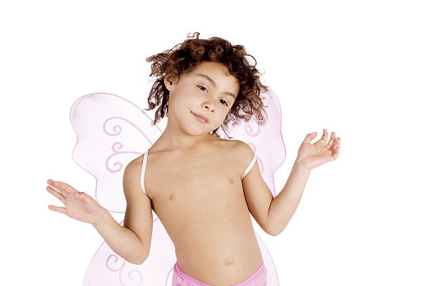 Flying cupid character with blond hair holding and hugging a big red heart in front of him, 3d illustration
