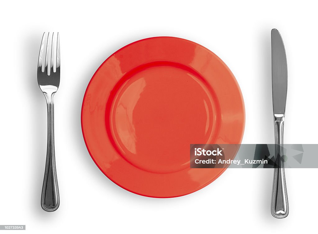 Rouge couteau, assiette et une fourchette isolé - Photo de Couteau de table libre de droits
