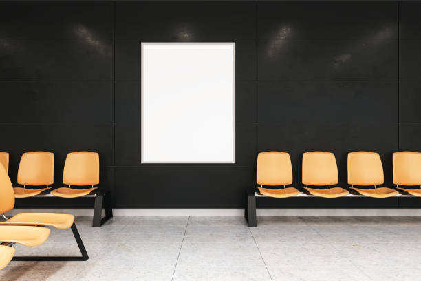 istock mockup poster on black wall in waiting hall 1027335926