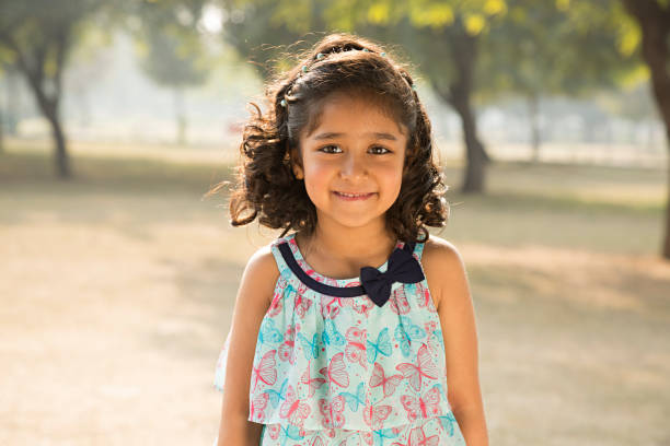 istock Girl looking camera - stock image - Stock image 1027341794