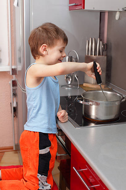 istock Child cooking porridge 102734186