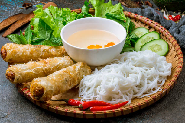istock vietnamese food spring rolls and noodle 1027341906
